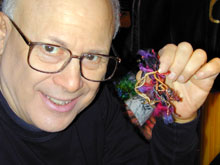 E.J. Gold displays a bead from Beads in Bondage series