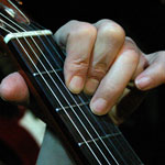 Guitar fingering for D chord by E.J. Gold