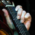 Guitar fingering for Dm chord by E.J. Gold