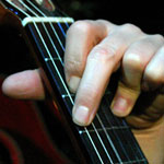 Guitar fingering for G chord by E.J. Gold
